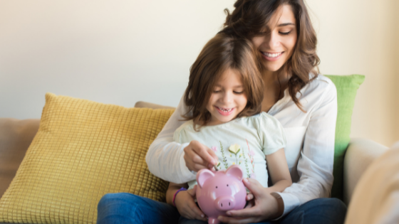 Parents teaching the value of money to their children